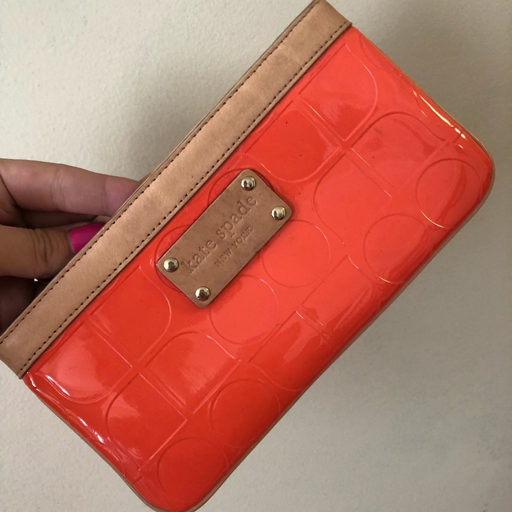 Coral Kate Spade wristlet.